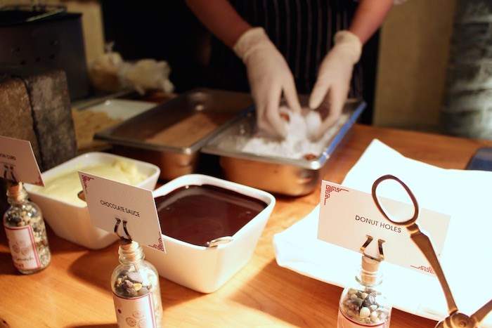  They fry churros and donut holes to order, and toss them in sugary coatings, with your choice of dipping sauce (Lindsay William-Ross/Vancouver Is Awesome)