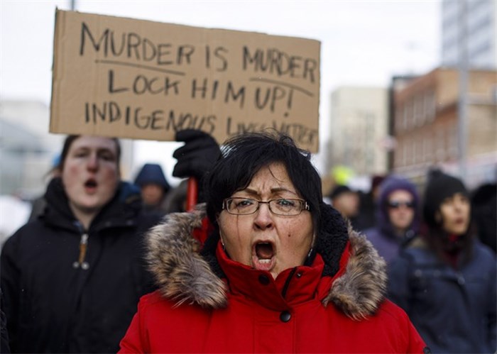  A marcher cries during a rally in response to Gerald Stanley's acquittal in the shooting death of Colten Boushie in Edmonton, Alta., on Saturday, February 10, 2018. THE CANADIAN PRESS/Jason Franson