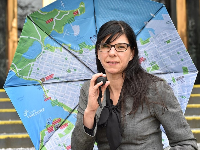  Coun. Andrea Reimer often uses a City of Vancouver-branded umbrella that is currently not available for sale to the public, but given as a gift to visiting dignitaries. Photo Dan Toulgoet