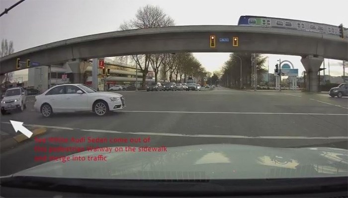  Stewart Sy's dashcam footage shows a crazy move from a Richmond driver, as she squeezes out of a strip mall parking lot then cuts across all traffic at a major intersection