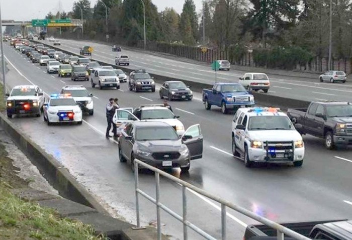  RCMP members block traffic on Highway 1 Tuesday afternoon after a high-risk takedown. photo supplied, North Vancouver RCMP