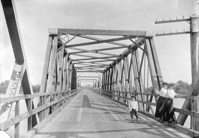  My great-grand aunt, Muriel Cornish, standing at right with a local woman named Ethel or Mary Tait, and my great-grand uncle, Wilfred Cornish, centre, on the Marpole Bridge in the early 1900s. Photo via Vancouver Archives