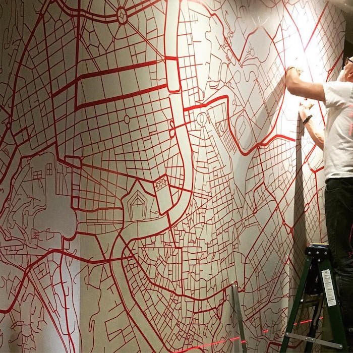  A map of Italian roads serves as wall decor (