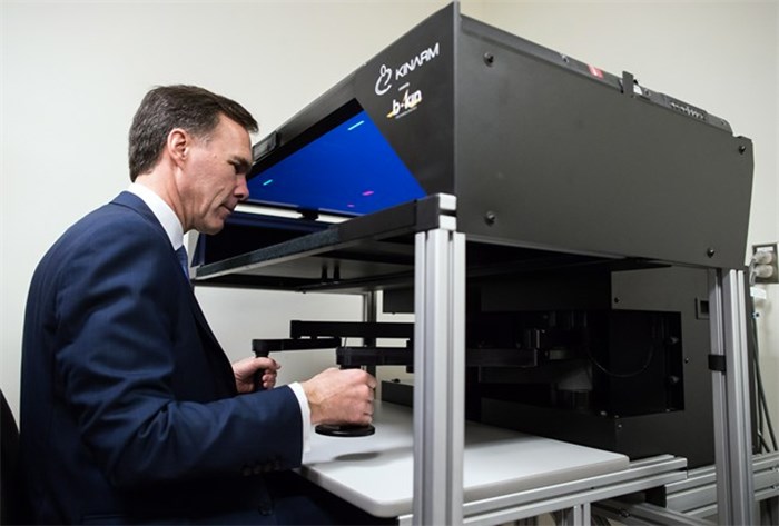  Finance Minister Bill Morneau practices a KINARM test used to test motor skills and brain functions after a stroke, during a tour of the Brain Behaviour Laboratory at the University of British Columbia in Vancouver, B.C., on Tuesday March 6, 2018. THE CANADIAN PRESS/Darryl Dyck