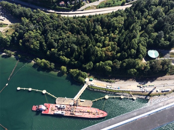  A tanker fills up at the Kinder Morgan Westridge Marine Terminal on the Burrard Inlet.  File photo