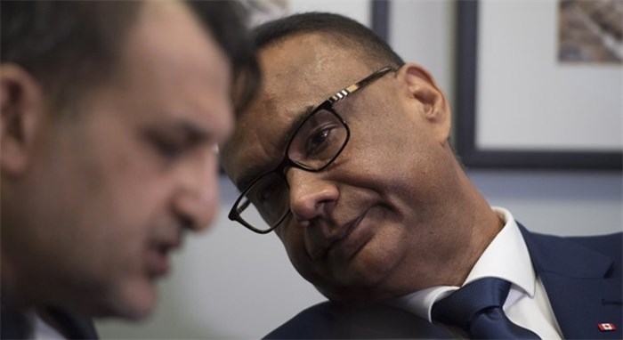  Jaspal Atwal, right, speaks to his lawyer Rishi T. Gill during a news conference in downtown Vancouver, on Thursday, March, 8, 2018. Atwal said Thursday that since he was convicted of trying to kill an Indian cabinet minister in 1986, he has tried to contribute to Canadian society and those efforts include meeting politicians from various parties. THE CANADIAN PRESS/Jonathan Hayward
