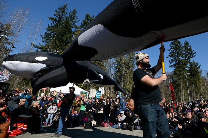  Members of the Tsleil-Waututh First Nation organized an anti-pipeline/Kinder Morgan demonstration starting at the Lake City Way SkyTrain station and then marched past the tank farm to Forest Grove park and the site of a permanent watch house. - Jennifer Gauthier