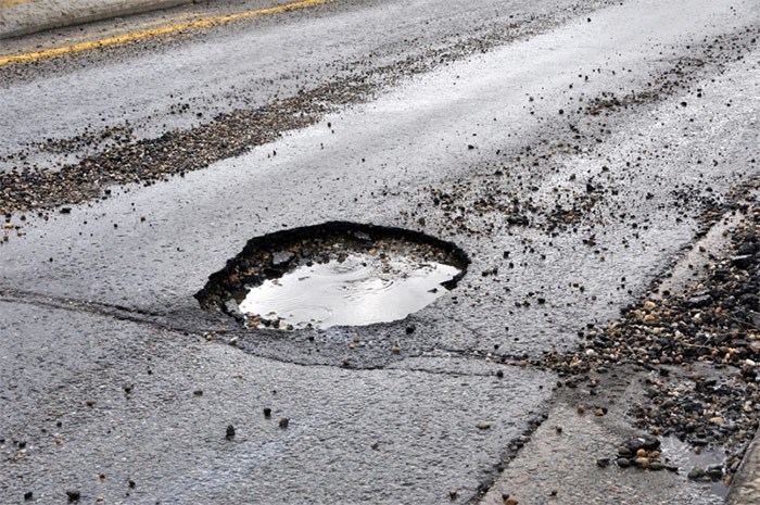  According to the city the average coast to repair a pot hole is $12.50 to $13.50. Photo iStock