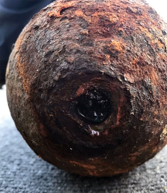  This corroded object, possibly an old military ordnance, was found buried on a Deep Cove property Monday afternoon. photo supplied North Vancouver RCMP