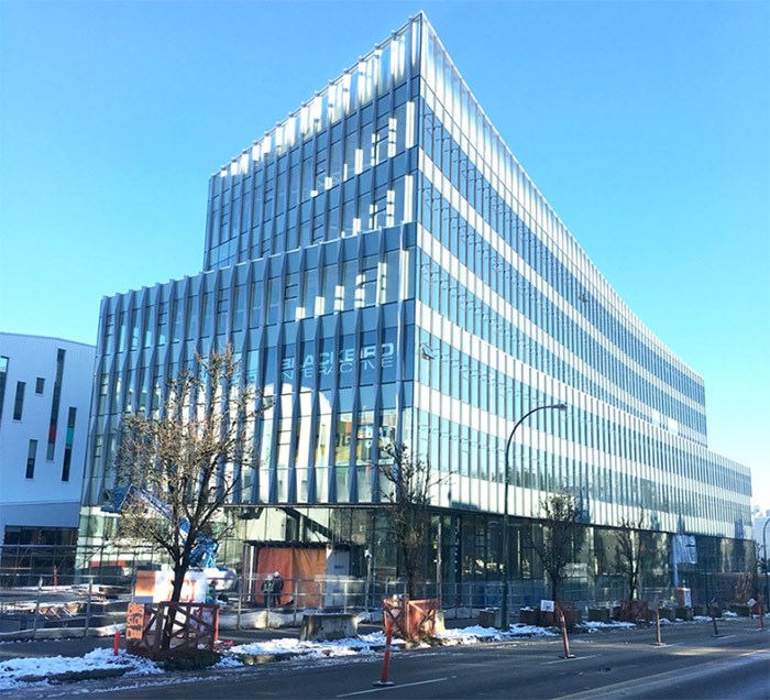  Construction continues on the first new office development on the False Creek Flats. The site doubled in assessed value in the past year, to $72 million. | Submitted