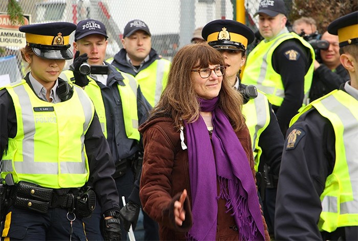  Barbara Stowe is arrested by Burnaby RCMP officers. - Lauren Boothby