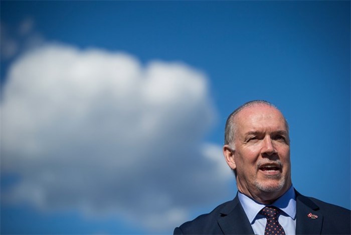  British Columbia Premier John Horgan speaks during a news conference with Washington State Gov. Jay Inslee about high speed rail, in Vancouver, B.C., on Friday March 16, 2018. THE CANADIAN PRESS/Darryl Dyck