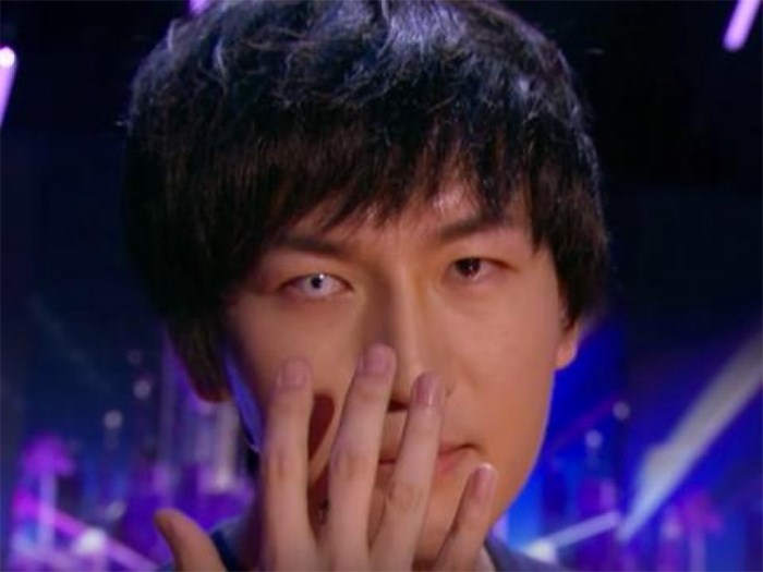  Will Tsai, performing magic show — Close-Up Magician Brings Dead Fish Back to Life