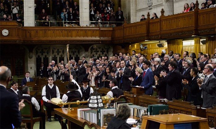  Prime Minister Justin Trudeau delivers a statement of exoneration on behalf of the Government of Canada to the Tsilhqot'in Nation and the descendants of six Tsilhqot'in Chiefs in the House of Commons on Parliament Hill in Ottawa on Monday, March 26, 2018. THE CANADIAN PRESS/Sean Kilpatrick