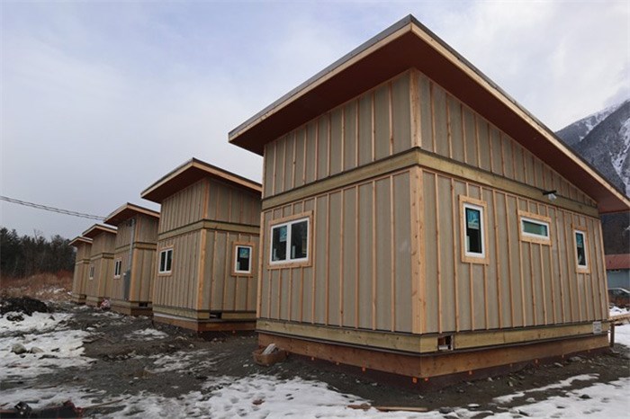  Tiny homes are shown in Bella Coola, B.C. in a handout photo. Members of a small B.C. First Nation have been working to build a tiny solution to homelessness in their community. In about a month's time, a colony of tiny homes in the Nuxalk First Nation in Bella Coola will open its doors to four single men who are homeless or at risk of homelessness. THE CANADIAN PRESS/HO-Jalissa Moody 