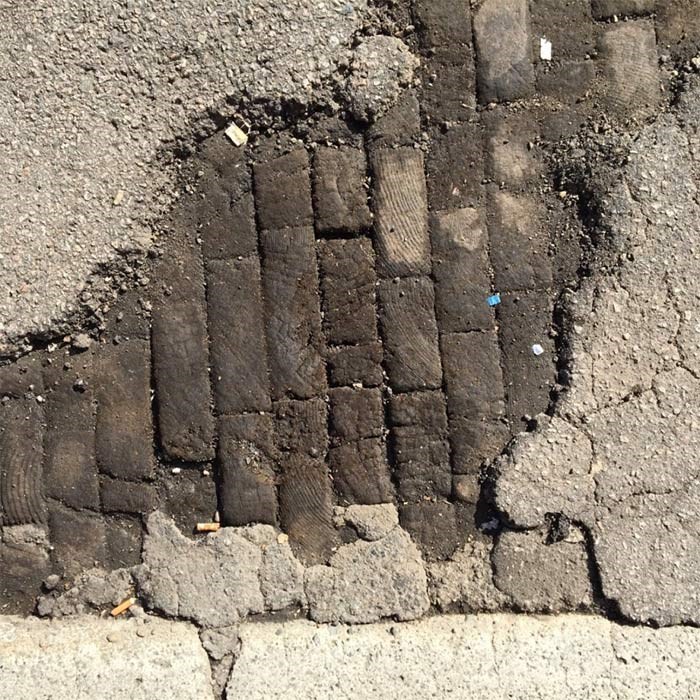  Old wooden pavers exposed on East Georgia Street, which date back more than 100 years. Photo Patrick Gunn, Heritage Vancouver Society