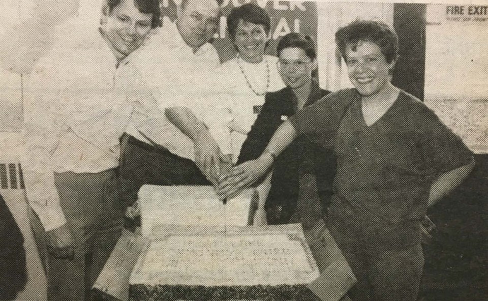  It was a day of fun and festivities at Trout Lake Community Centre Saturday as neighbourhood residents, special guests and community members joined in for Centennial celebrations commemorating Vancouver's 100th birthday. Seen here cutting the birthday cake (left to right) alderman Gordon Campbell, Trout Lake Community Centre Association president Rolly Skov, parks commissioners Connie Fogal and Sue Harris and alderman Libby Davies. Photo Jim Hutson.