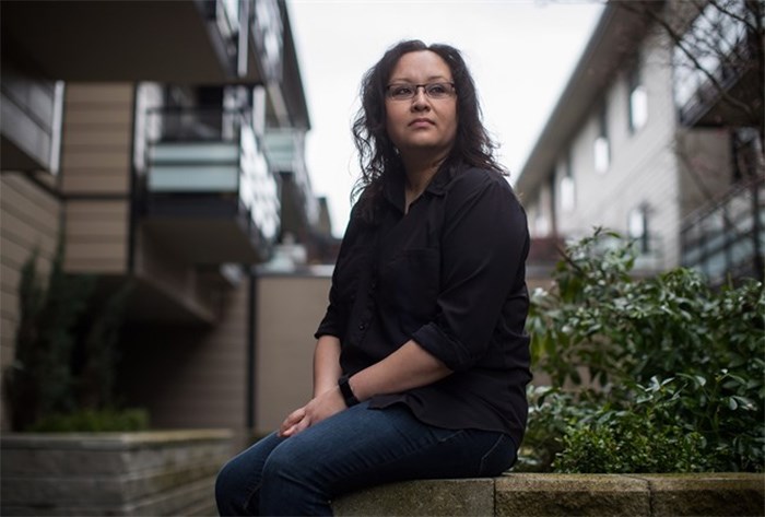  Tamara Parrales, who paid for an MRI at a private clinic, sits for a photograph at her home in Burnaby, B.C., on Saturday April 7, 2018. Excruciating pain had Tamara Parrales heading to the emergency department multiple times for nearly a year, and when a specialist brought up the possibility of ovarian cancer, she wasn't prepared to wait several months for an MRI in the public system. THE CANADIAN PRESS/Darryl Dyck