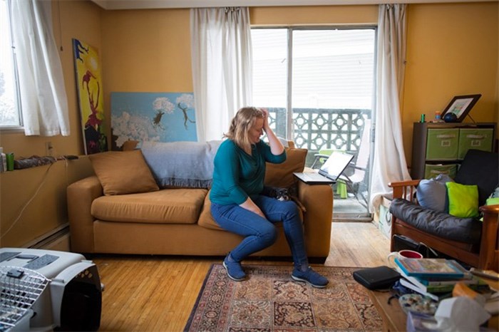  Joanna Fletcher reacts while speaking about the living conditions in the one-bedroom apartment where she lives with her 10-year-old son, in Vancouver, B.C., on Friday February 23, 2018. Fletcher says the building has mice and mould, and her new landlord is threatening eviction but she's fighting to stay for as long as possible because she can't afford anything else in the area and leaving would mean disrupting her son's school year. THE CANADIAN PRESS/Darryl Dyck