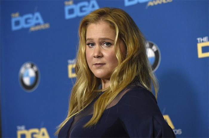  Amy Schumer poses in the press room at the 70th annual Directors Guild of America Awards at The Beverly Hilton hotel on Saturday, Feb. 3, 2018, in Beverly Hills, Calif. A father is calling on theatres to ensure that family-friendly movies are not spoiled before they start after an uncomfortable outing with his daughter prompted Cineplex to pull a trailer featuring Schumer from certain screenings in British Columbia. THE CANADIAN PRESS/Photo by Chris Pizzello/Invision/AP