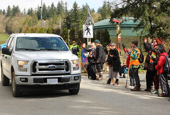  Protesters move to allow a vehicle to leave the Trans Mountain terminal in Burnaby. - Lauren Boothby