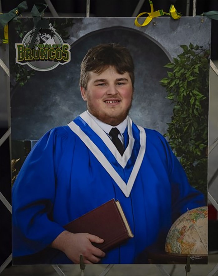  Bus crash victim Brody Hinz, 18, who compiled stats for the Humboldt Broncos and worked for local radio station 107.5 Bolt FM, is shown in a photo on display at the Elgar Petersen Arena in Humboldt, Sask., on Monday, April 9, 2018. The Broncos stats keeper is being remembered for his math, memory and kindness. THE CANADIAN PRESS/Liam Richards