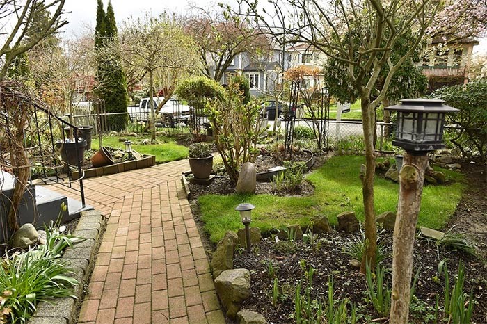  Christine Oviedo and her husband took good care of the yard of a home that's been in her family since 1939. Photo Dan Toulgoet