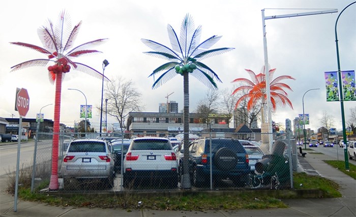  Fake neon palm trees made Best Import Auto Ltd. easy to pick out on Kingsway near Imperial Street.