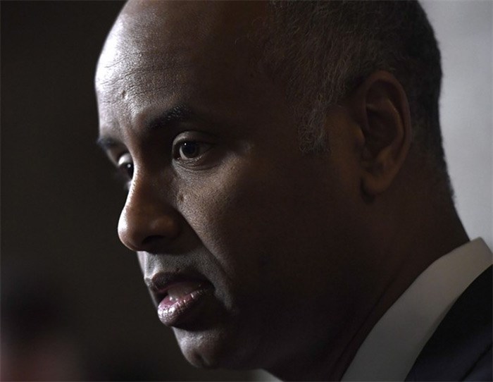  Minister of Immigration, Refugees and Citizenship Ahmed Hussen makes an announcement on medical inadmissibility in the Foyer of the House of Commons on Parliament Hill in Ottawa on Monday, April 16, 2018. THE CANADIAN PRESS/Justin Tang
