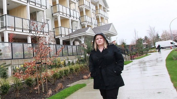  Elyse Vroom walks in front of Murrayville House, where she bought a pre-sale contract for a home. She then found out that when the developer went into receivership, BC Supreme Court would nullify the contract?| Rob Kruyt