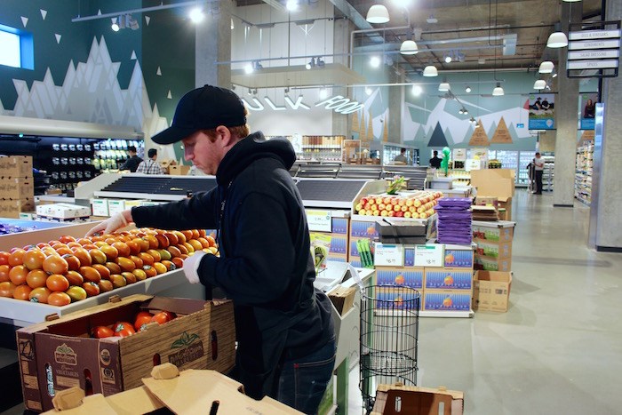  Starting to stock the produce section (Lindsay William-Ross/Vancouver Is Awesome)