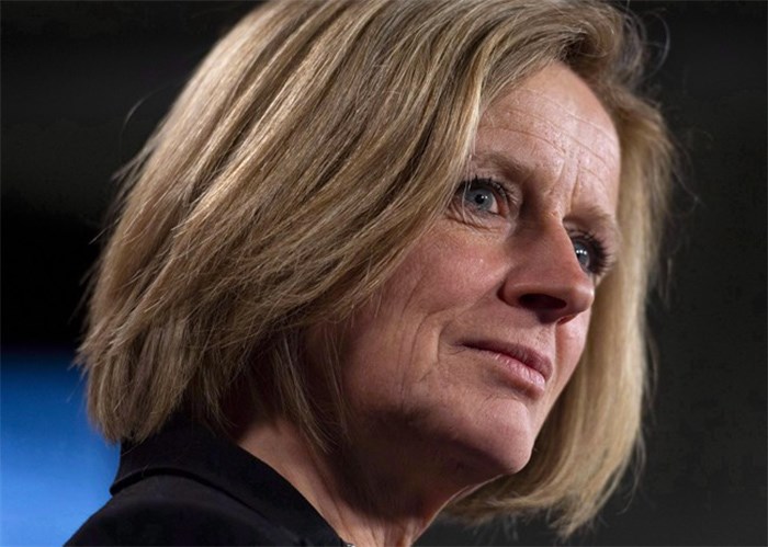  Alberta Premier Rachel Notley speaks during a press conference to discuss her meeting with Prime Minister Justin Trudeau and B.C. Premier John Horgan on the deadlock over Kinder Morgan's Trans Mountain pipeline expansion, on Parliament Hill in Ottawa on Sunday, April 15, 2018. Notley says she doesn't agree with the University of Alberta's decision to grant an honourary degree to high-profile oilsands critic David Suzuki. THE CANADIAN PRESS/Justin Tang