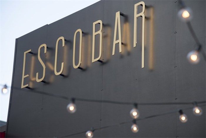  Escobar the restaurant is pictured in Vancouver, B.C., Tuesday, May, 1, 2018. A Latin-themed restaurant in Vancouver is drawing criticism for the name it shares with a famed Colombian drug lord linked to thousands of deaths. A spokeswoman for Escobar restaurant said they aren't trying to make a statement or offend anyone with the name. THE CANADIAN PRESS/Jonathan Hayward