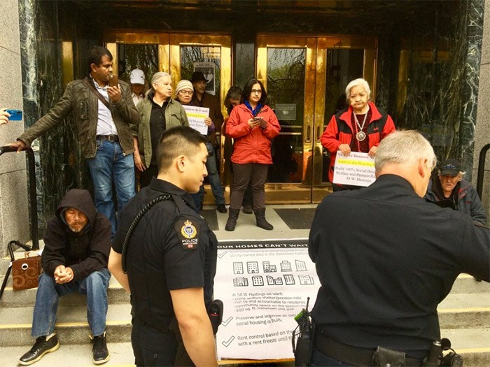  Protesters started blocking doors at city hall early Tuesday morning, May 1. Photo Mike Howell