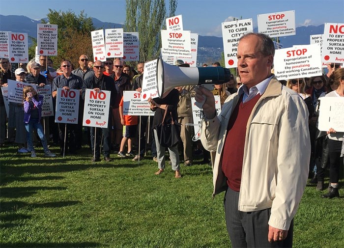  People took turns addressing the crowd of roughly 300 people at the May 1 rally against the B.C. government's 