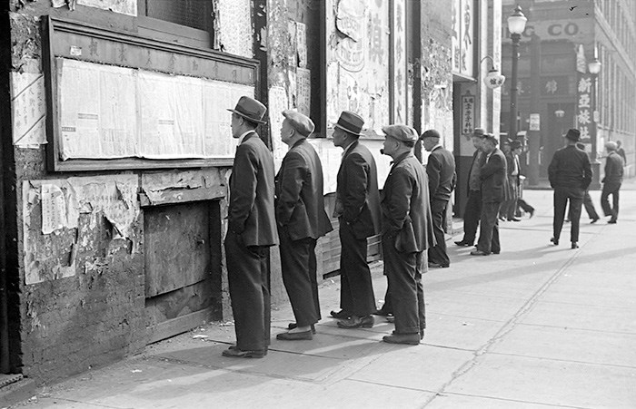  Men reading posted newspapers in Chinatown, 1937. Vancouver Archives Item: CVA 260-758