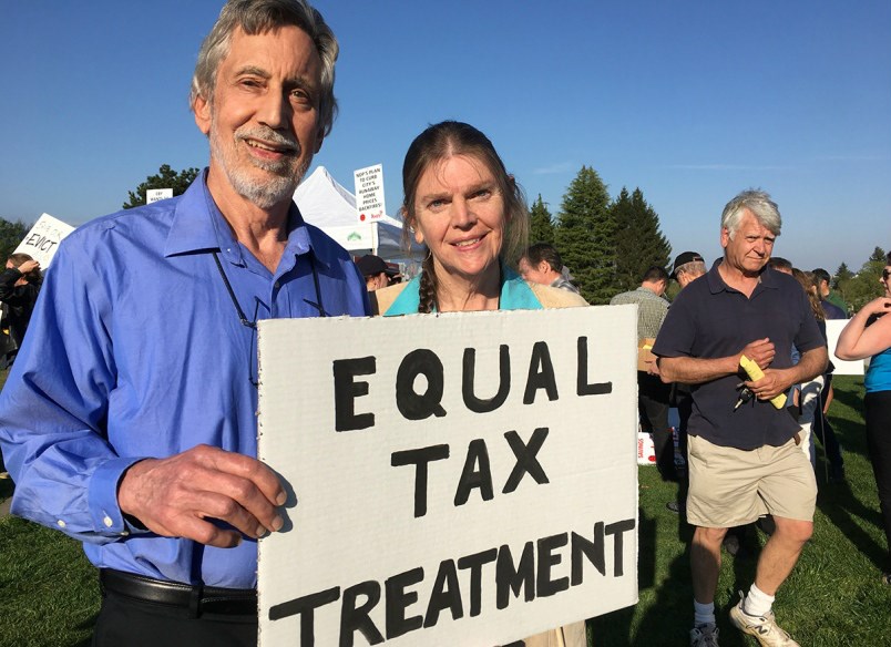  David Tha and Paula Maisonville, who spoke at Tuesday night’s tax protest at Trimble Park, are cutting back on their household expenses to try to afford the additional $12,000 in taxes they’ll have to pay for their Point Grey home.