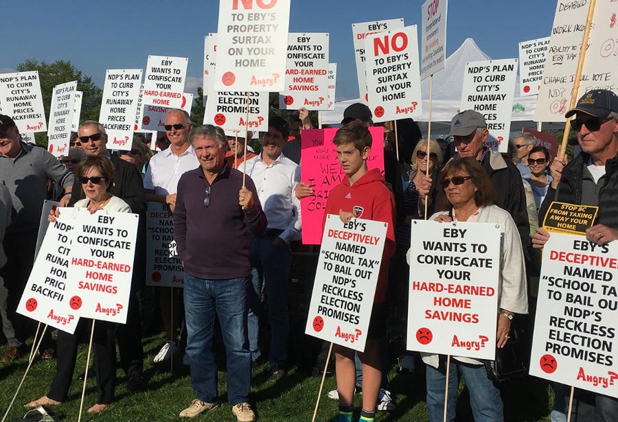  Abut 300 people attended Tuesday night's rally against the NDP government's new school surtax. - Martha Perkins