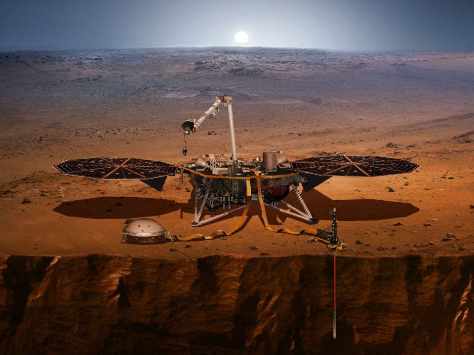  An artist’s rendition of the InSight lander operating on the surface of Mars. Credit: NASA