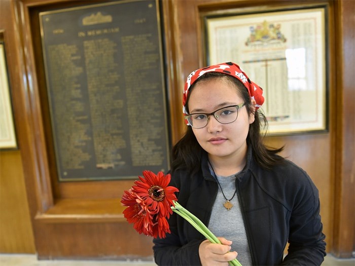  Grade 8 Kitsilano secondary school student Sayako Leznoff has been quietly placing flowers underneath a school plaque commemorating the school’s 141 Second World War casualties since late last year.