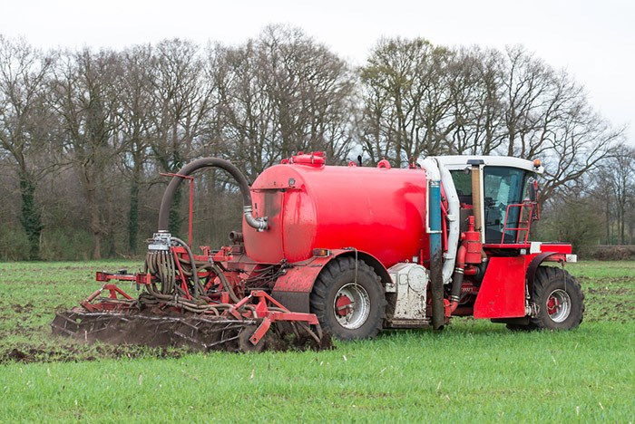  Liquid manure shown being applied to farmland. Some suspect the smell might be wafting up from farms to the south of the city. Photo Shutterstock