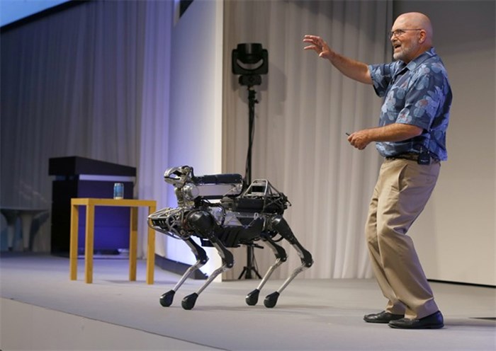  In this July 20, 2017 file photo, Boston Dynamics Chief Executive Marc Raibert speaks about his four-legged robot SpotMini during a SoftBank World presentation at a hotel in Tokyo. (AP Photo/Shizuo Kambayashi, File)