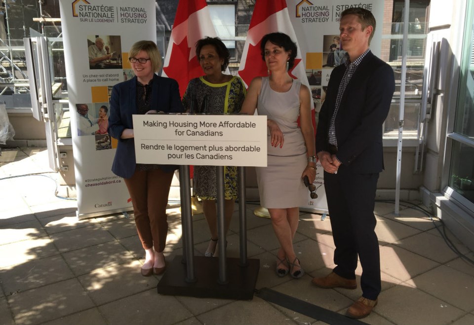  Left to right: Public Services and Procurement Minister Carla Qualtrough, Vancouver Centre Liberal MP Hedy Fry, Atira Women's Resource Society CEO Janice Abbott, and City of Vancouver senior planner Dan Garrison