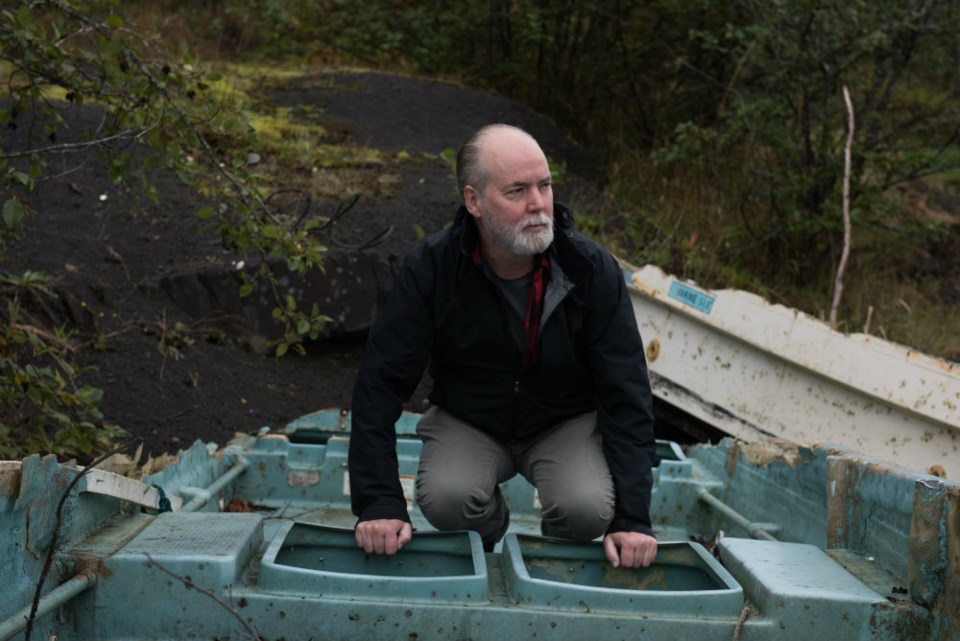  Photo of Douglas Coupland gathering marine debris in Haida Gwaii courtesy of the Vancouver Aquarium