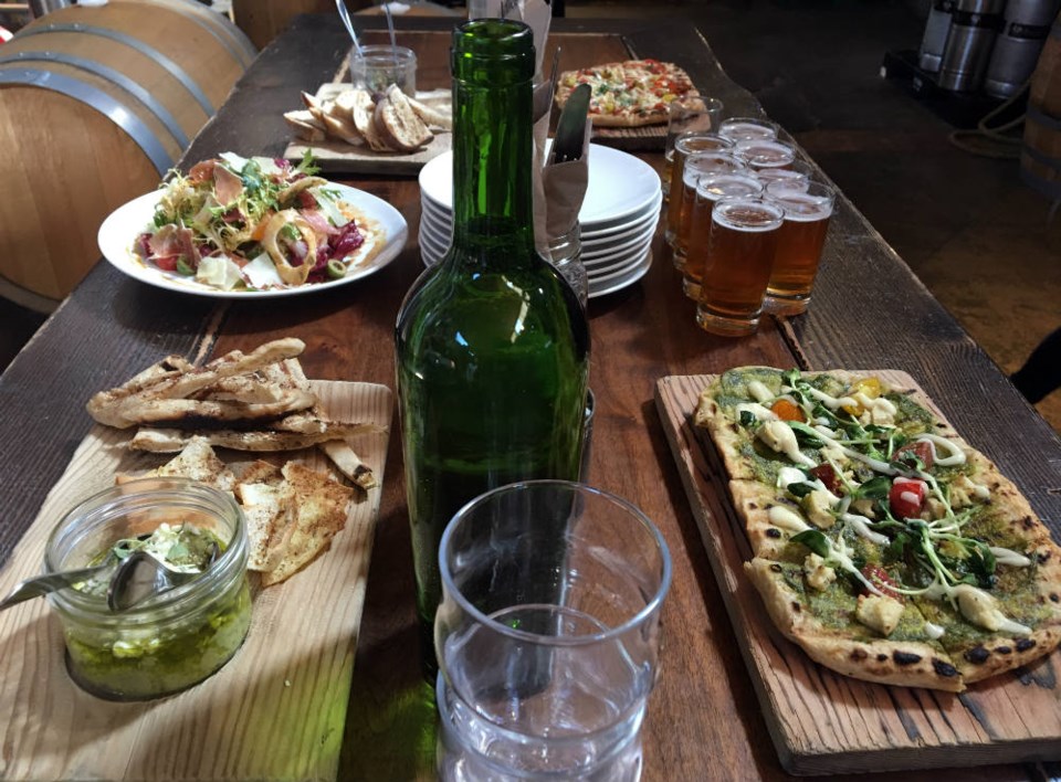  Beer, pizza and other appetizers at Postmark Brewing. Photo Melissa Shaw