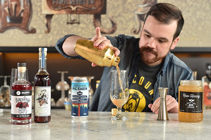  Bartender Shaun Layton works his magic. Photo: Dan Toulgoet.