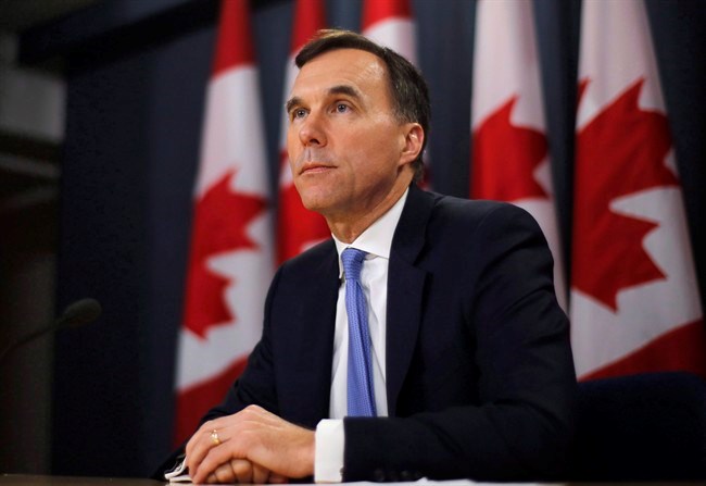  Finance Minister Bill Morneau speaks about the Trans Mountain Expansion project at a press conference in Ottawa on May 16, 2018. Finance Minister Bill Morneau will announce as early as Tuesday morning where the government plans to go with Kinder Morgan to ensure the controversial Trans Mountain pipeline expansion gets built.There are three options on the table, which include the government buying and building the expansion, then selling it once it's complete; and buying it on an interim basis, then selling it to investors and leaving them to handle the construction. THE CANADIAN PRESS/Patrick Doyle