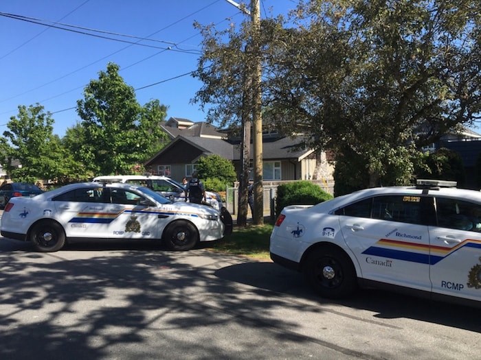  Police are on Jesmond Drive Thursday afternoon. (Graeme Wood/Richmond News)