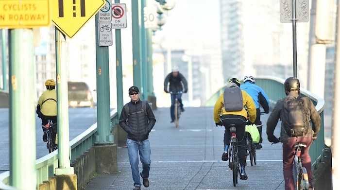  Vancouver city council earlier this year approved a plan that will add an interim southbound protected bike lane to the Cambie Bridge. Construction is slated to start on Saturday, June 2. Photo Dan Toulgoet