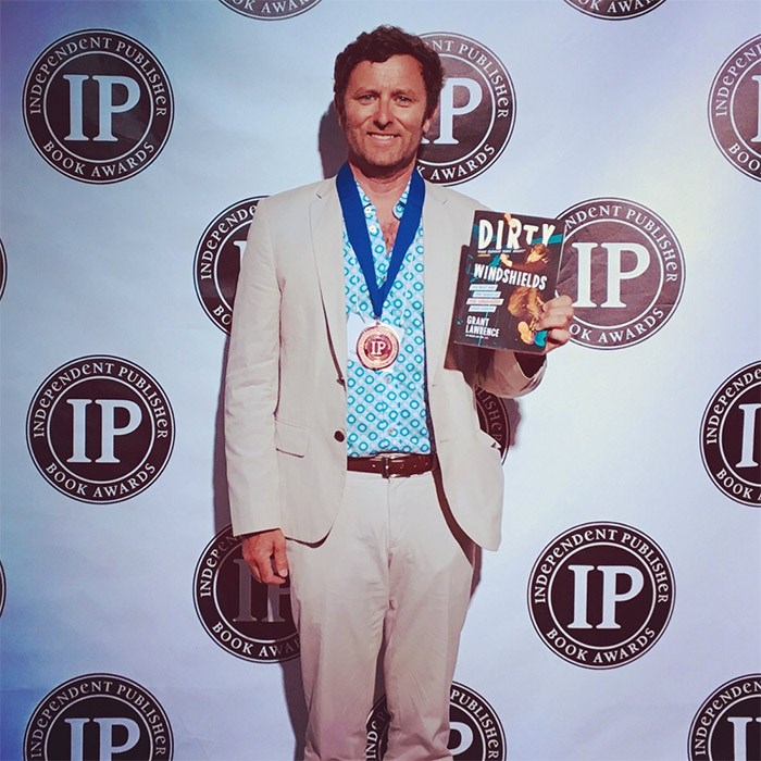  Putting the pedal to the medal, Grant Lawrence poses for a press photo before hightailing it to JFK to catch the redeye back to Vancouver.